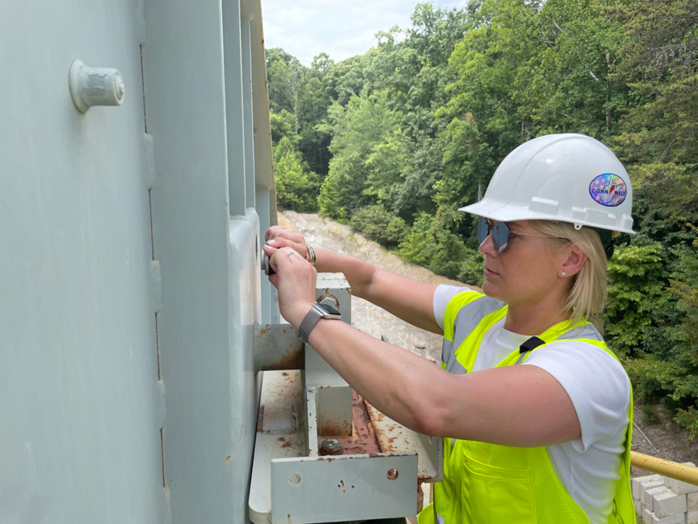 woman working on equipment