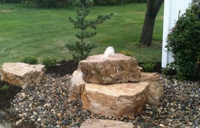 Drilled boulders for fountain