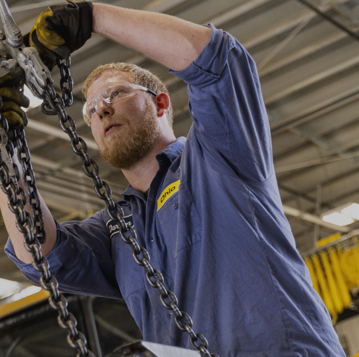 mechanic working on chain